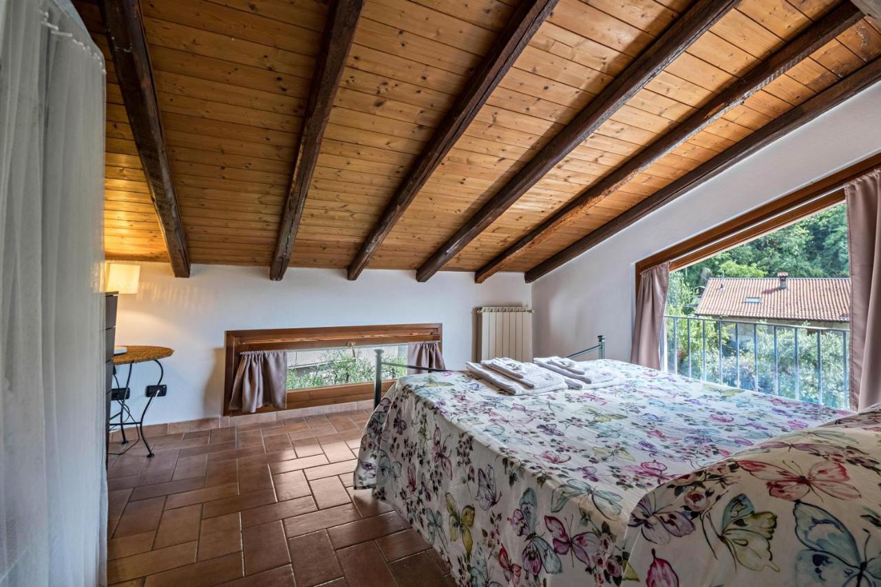 Mansarda con vista lago Sulzano Exterior foto