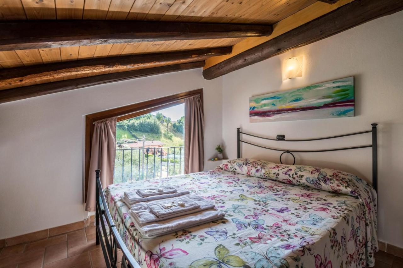 Mansarda con vista lago Sulzano Exterior foto